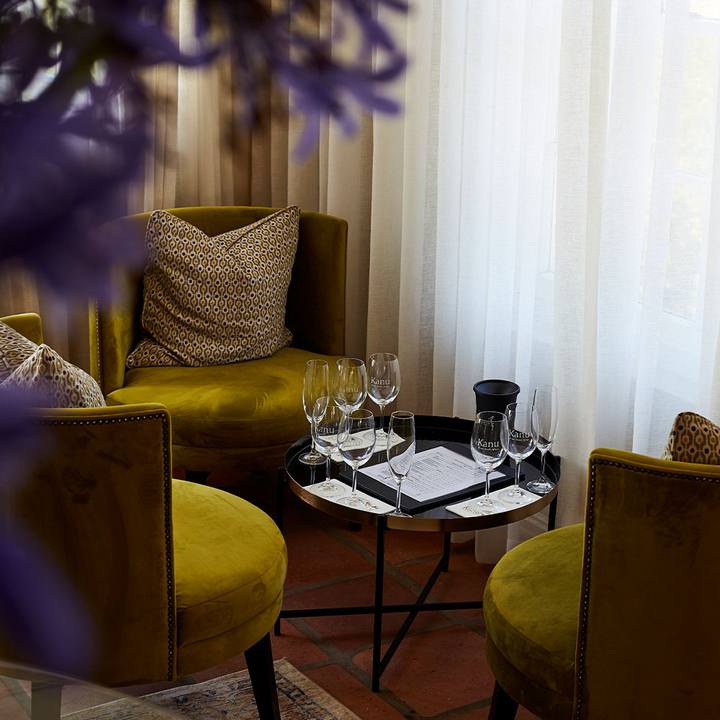 Tasting lounge among mustard-yellow chairs